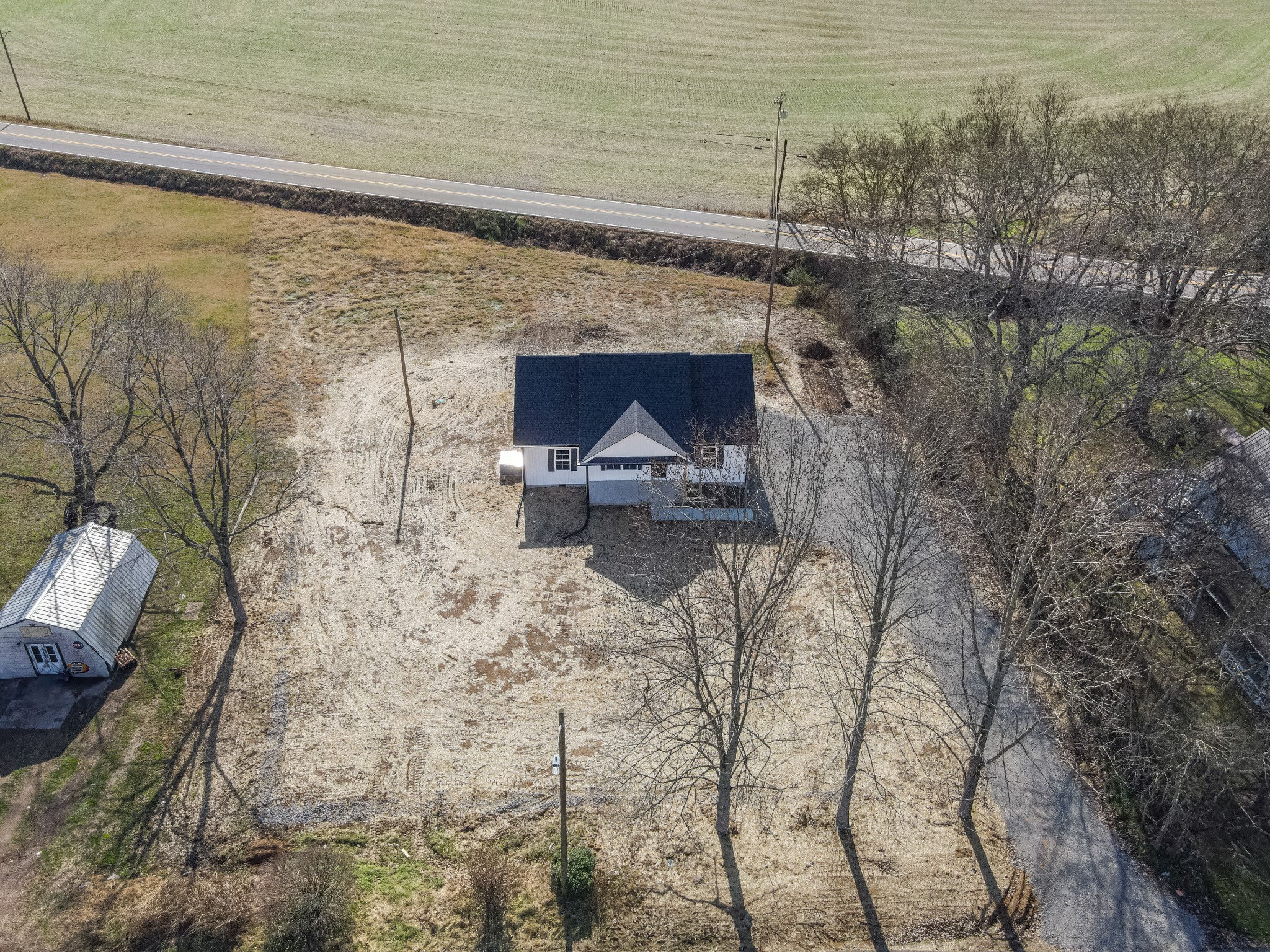 7 Orchard Cemetery Road Petersburg, TN 37144 - Photo 15 of 53 a living room with a fireplace