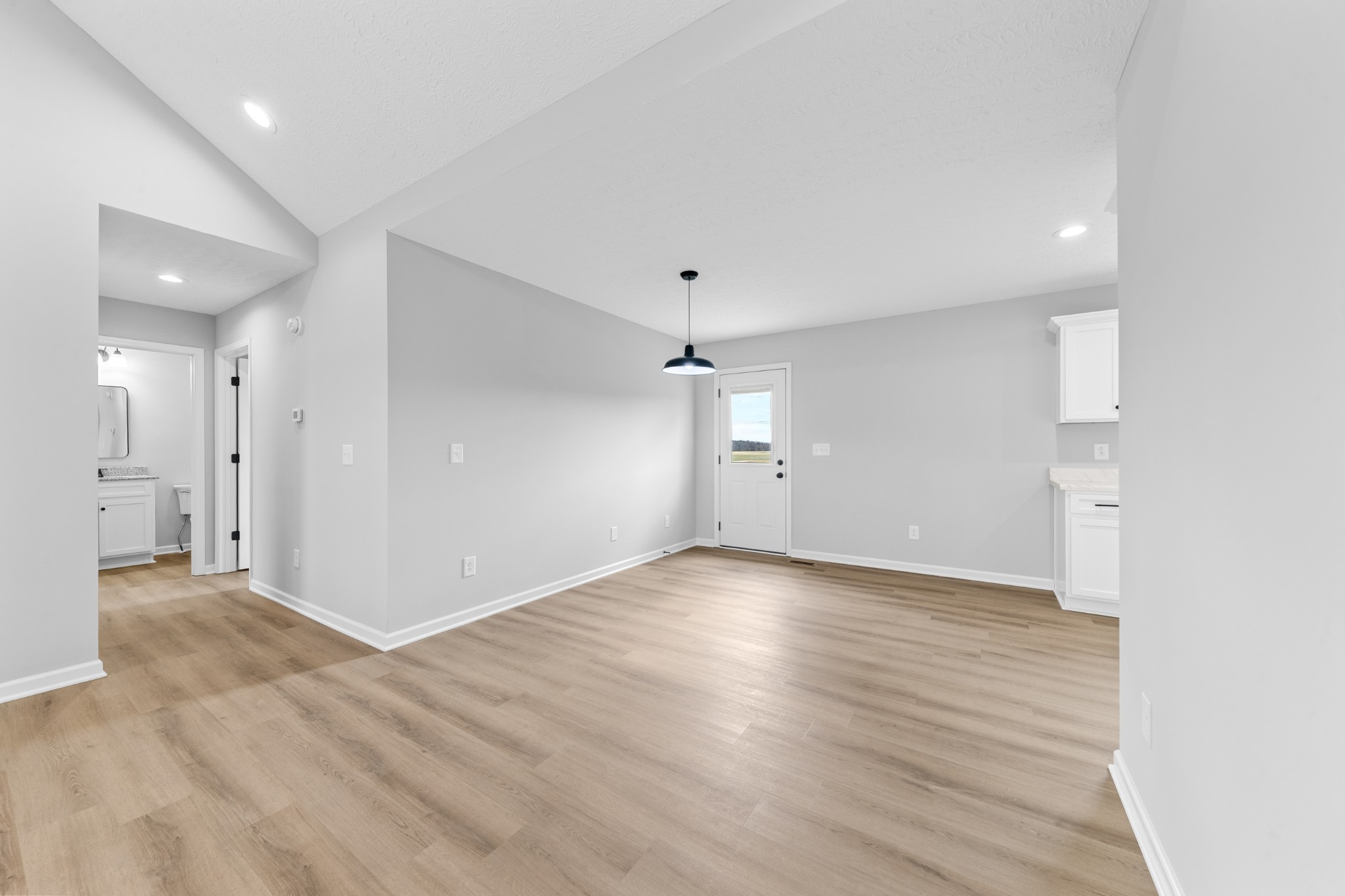 7 Orchard Cemetery Road Petersburg, TN 37144 - Photo 28 of 53 an empty room with wooden floor and windows