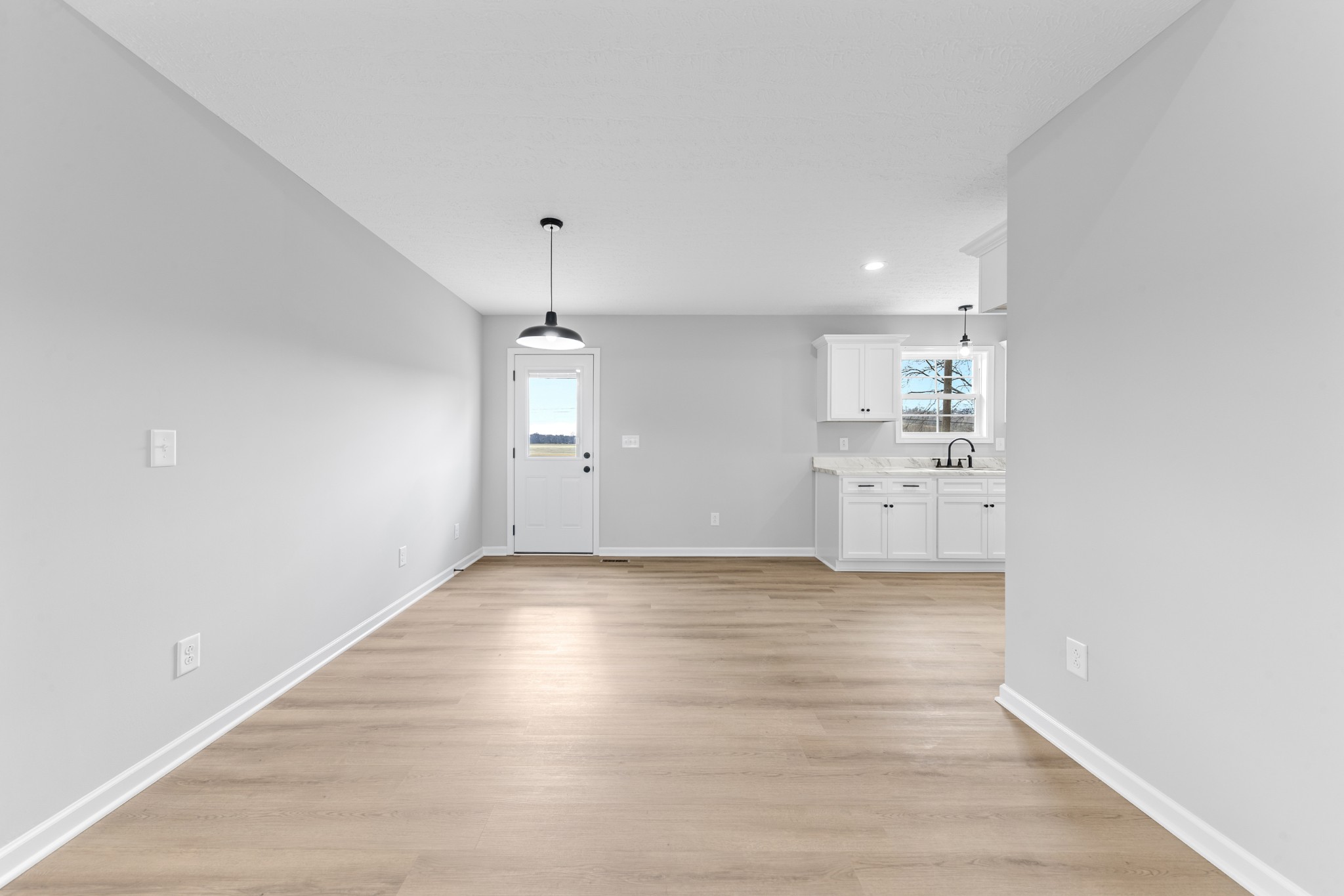 7 Orchard Cemetery Road Petersburg, TN 37144 - Photo 29 of 53 an empty room with wooden floor and windows