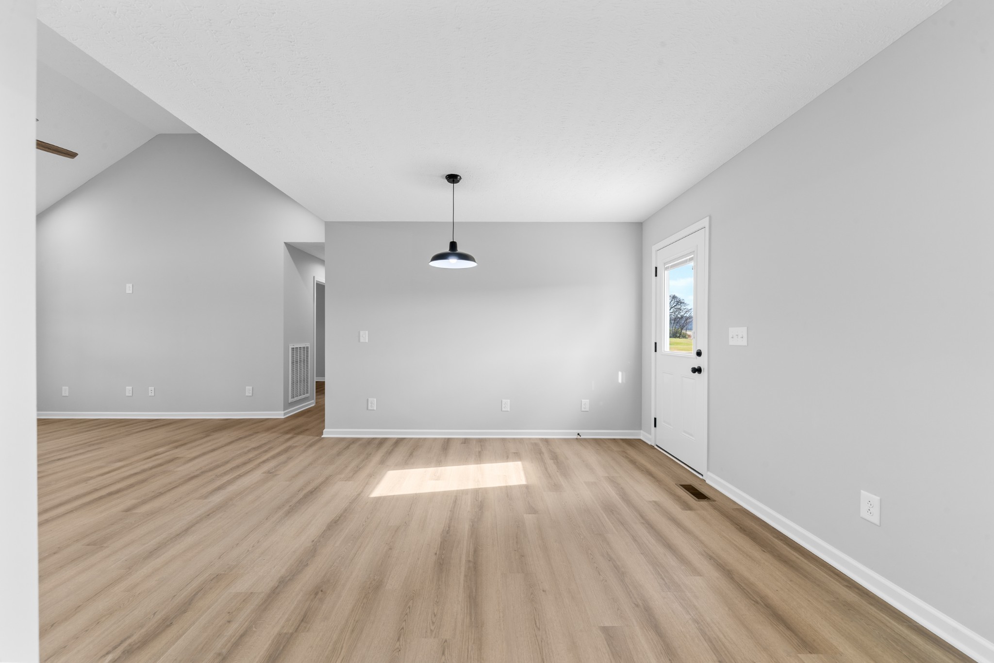 7 Orchard Cemetery Road Petersburg, TN 37144 - Photo 31 of 53 an empty room with wooden floor and windows