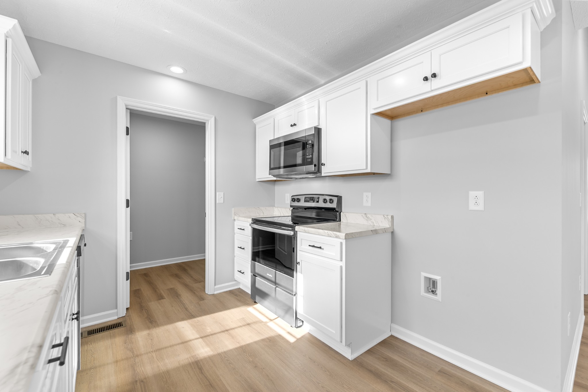 7 Orchard Cemetery Road Petersburg, TN 37144 - Photo 36 of 53 a kitchen with a refrigerator stove and microwave