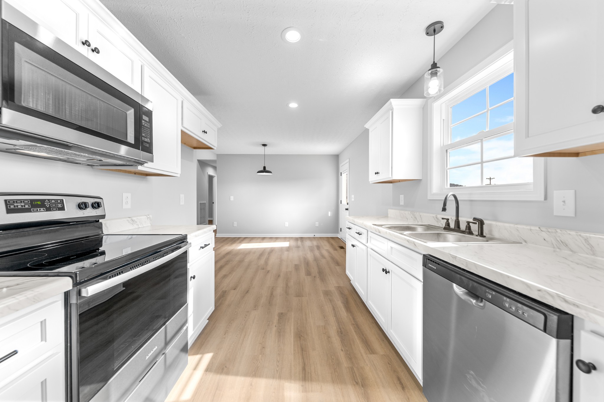 7 Orchard Cemetery Road Petersburg, TN 37144 - Photo 38 of 53 a kitchen with a sink stove and microwave