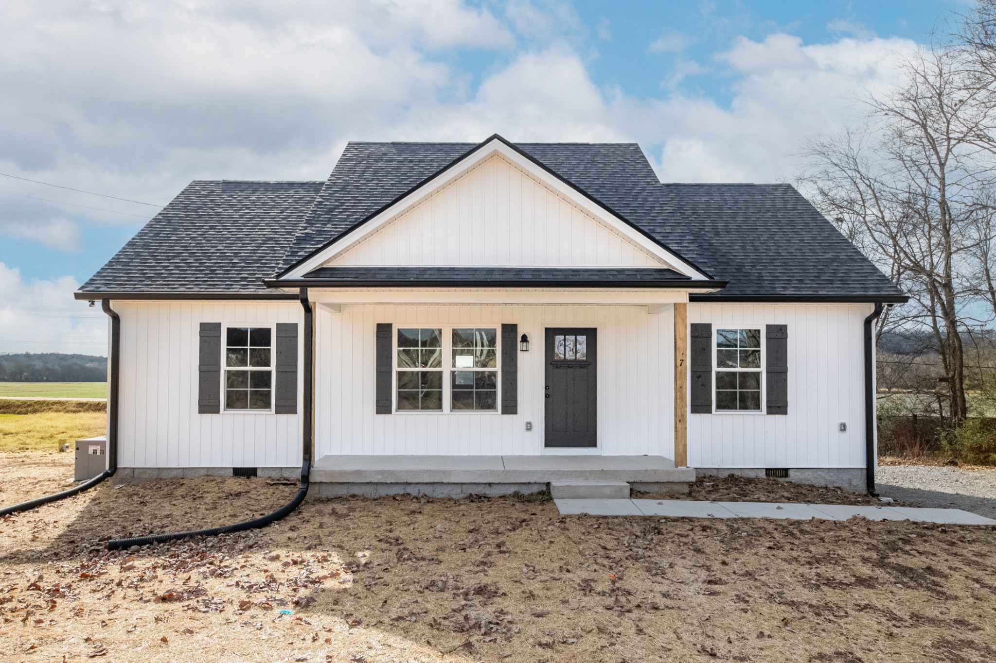 7 Orchard Cemetery Road Petersburg, TN 37144 - Photo 4 of 53 a front view of a house with a yard