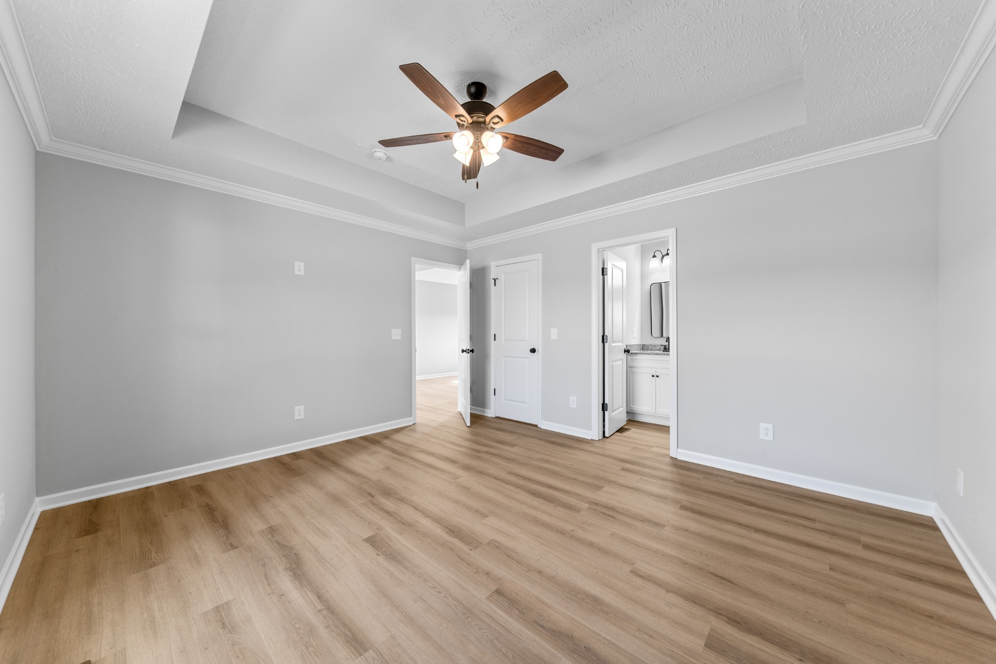 7 Orchard Cemetery Road Petersburg, TN 37144 - Photo 43 of 53 a view of an empty room with wooden floor and a ceiling fan