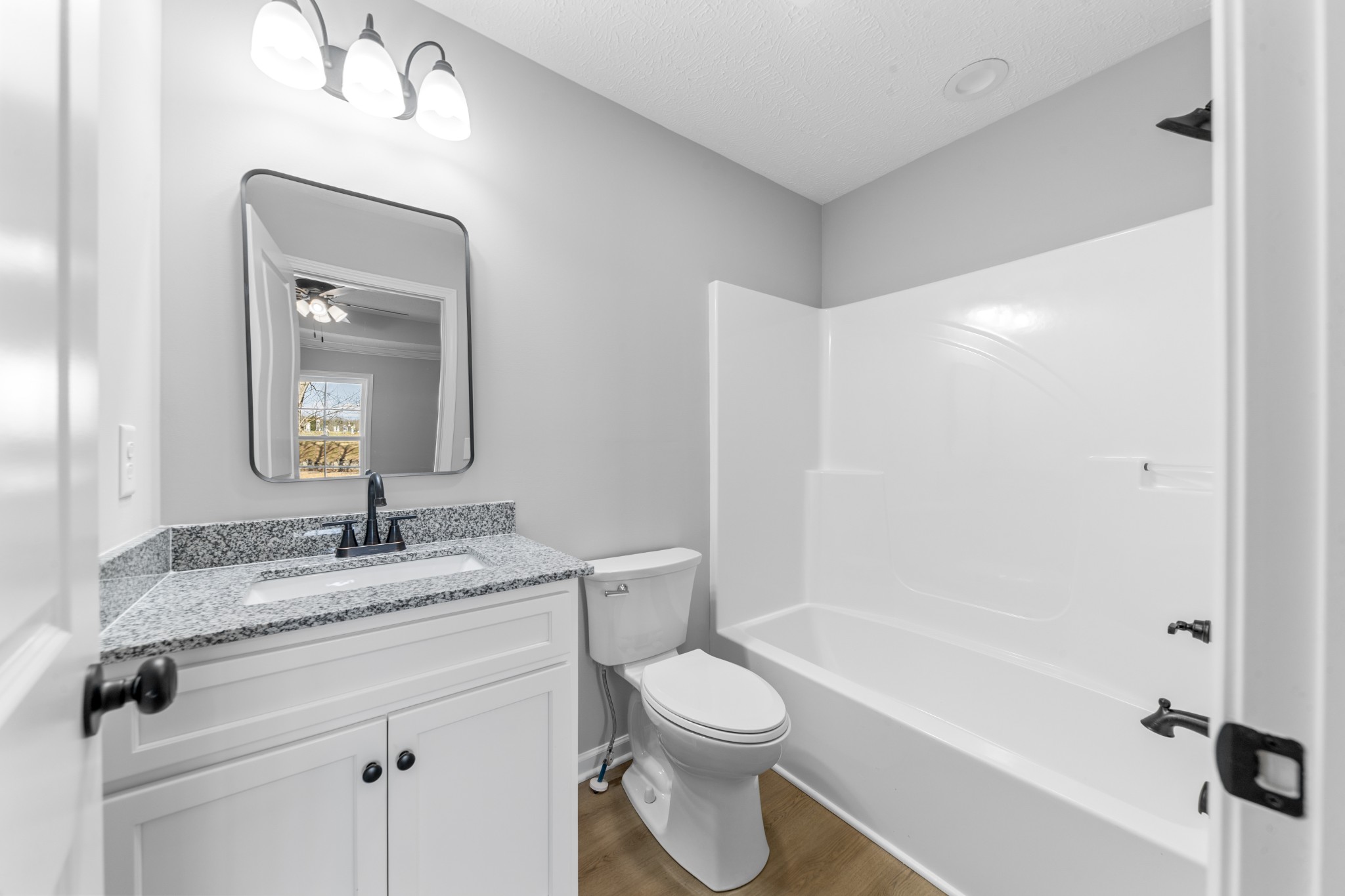 7 Orchard Cemetery Road Petersburg, TN 37144 - Photo 45 of 53 a bathroom with a granite countertop sink toilet and shower