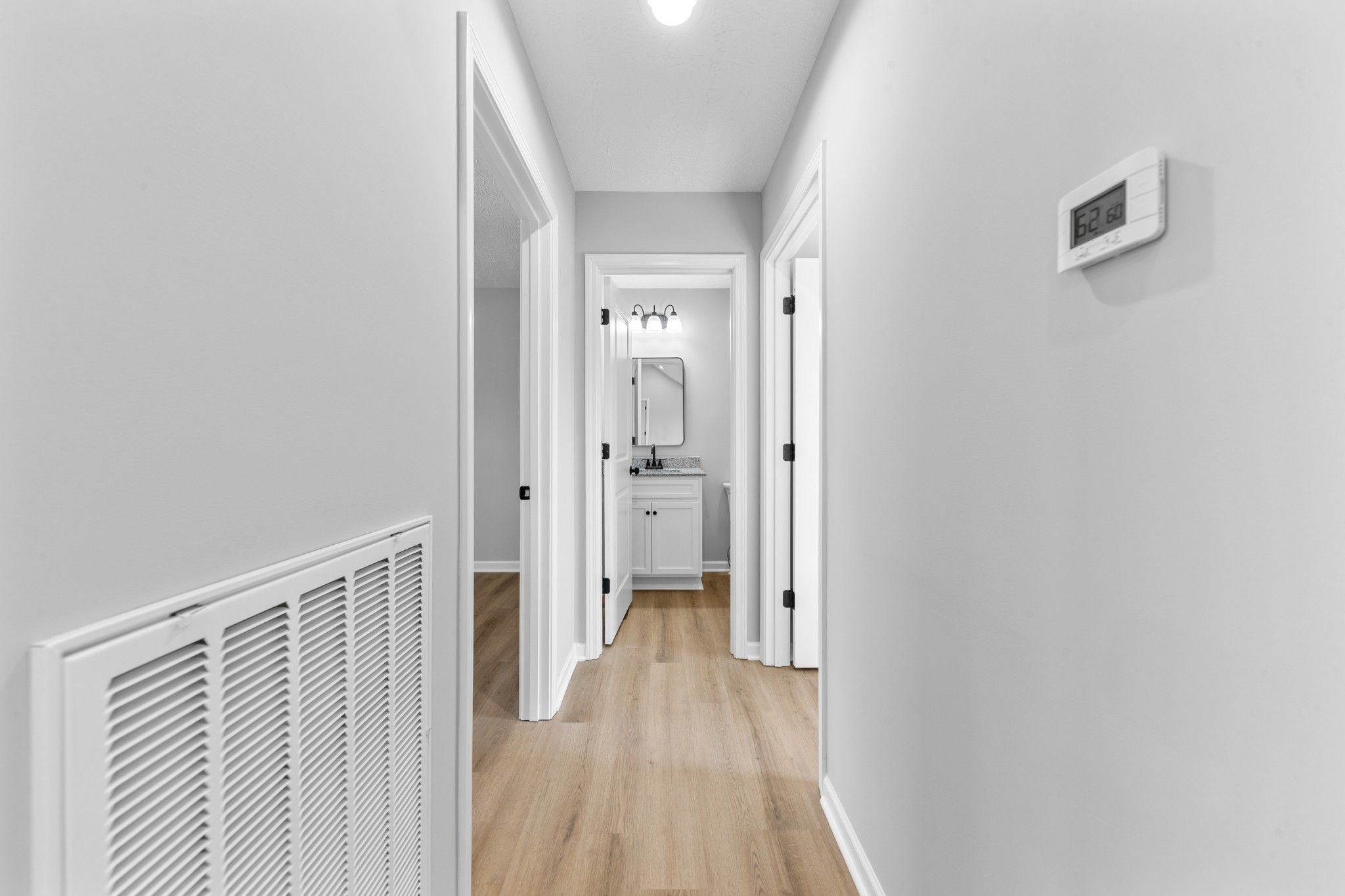 7 Orchard Cemetery Road Petersburg, TN 37144 - Photo 46 of 53 a view of a hallway with wooden floor and a bathroom