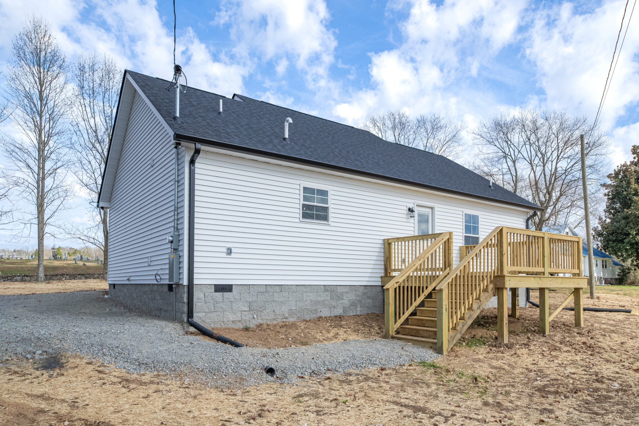 7 Orchard Cemetery Road Petersburg, TN 37144 - Photo 8 of 53 a backyard of a house with barbeque oven table and chairs
