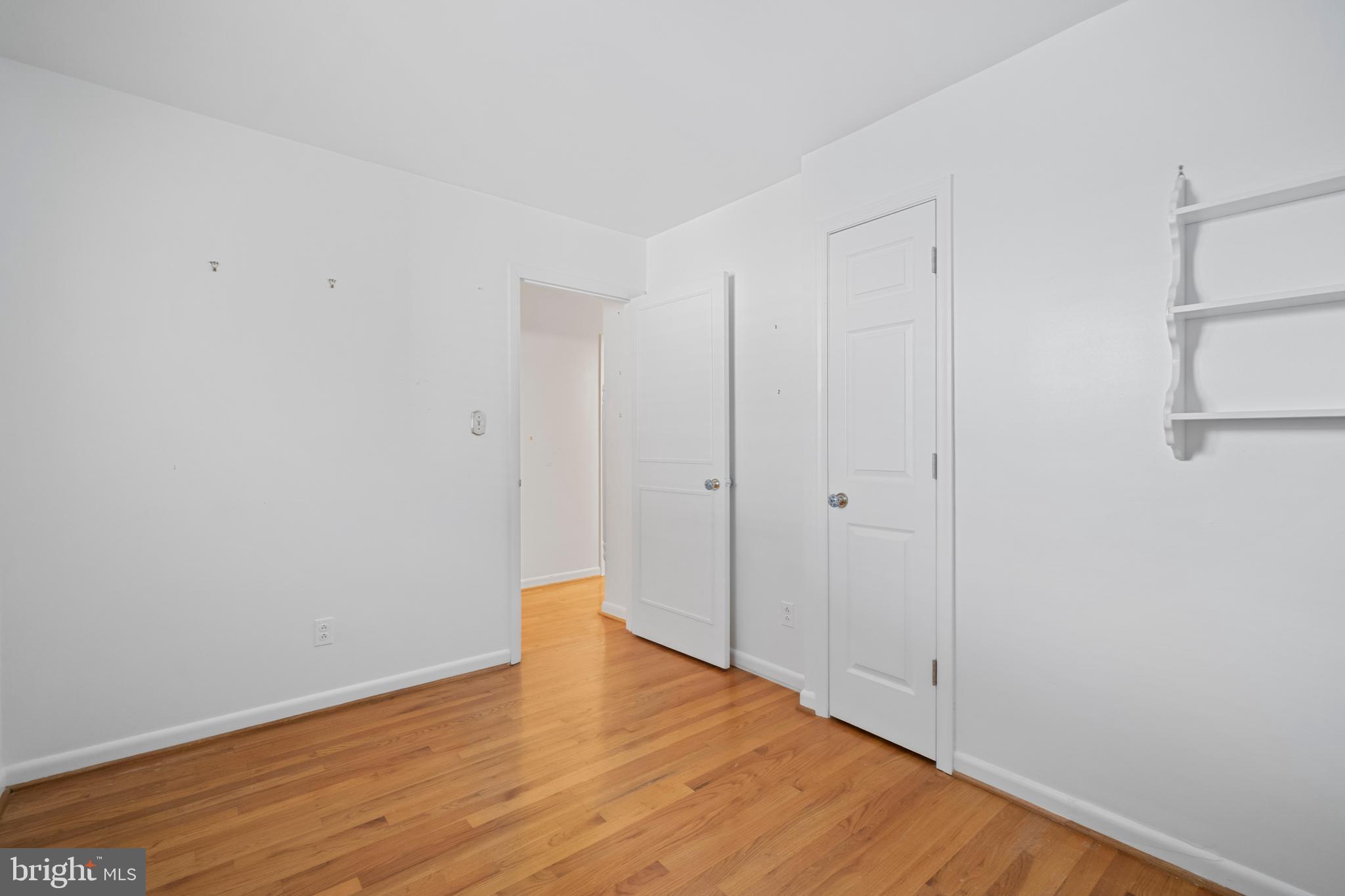 530 Anneslie Road Baltimore, MD 21212 - Photo 14 of 38 a view of an empty room with wooden floor