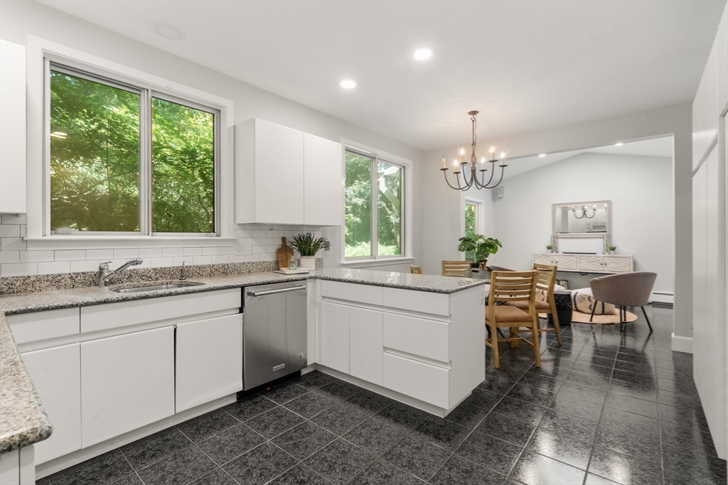 214 Allandale Road, Unit B Boston, MA 02467 - Photo 12 of 35 a kitchen with sink and window