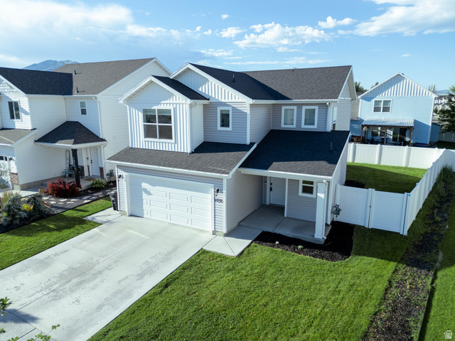 1486 West 2055th Street South Logan, UT 84339 - Photo 35 of 45 Contemporary two-story residence featuring light gray siding and white trim