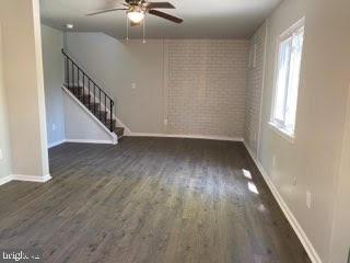 65 Berkshire Road Sicklerville, NJ 08081 - Photo 14 of 29 a view of an empty room with wooden floor and fan