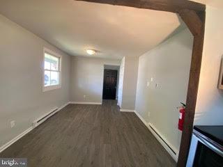 65 Berkshire Road Sicklerville, NJ 08081 - Photo 5 of 29 wooden floor in an empty room with a window