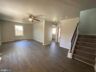 65 Berkshire Road Sicklerville, NJ 08081 - Photo 8 of 29 wooden floor in an empty room with a window
