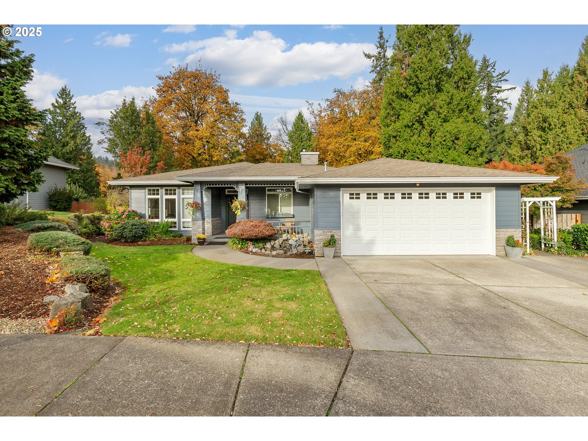 2573 Southeast Morlan Way Gresham, OR 97080 - Photo 2 of 47 a view of a house with a yard
