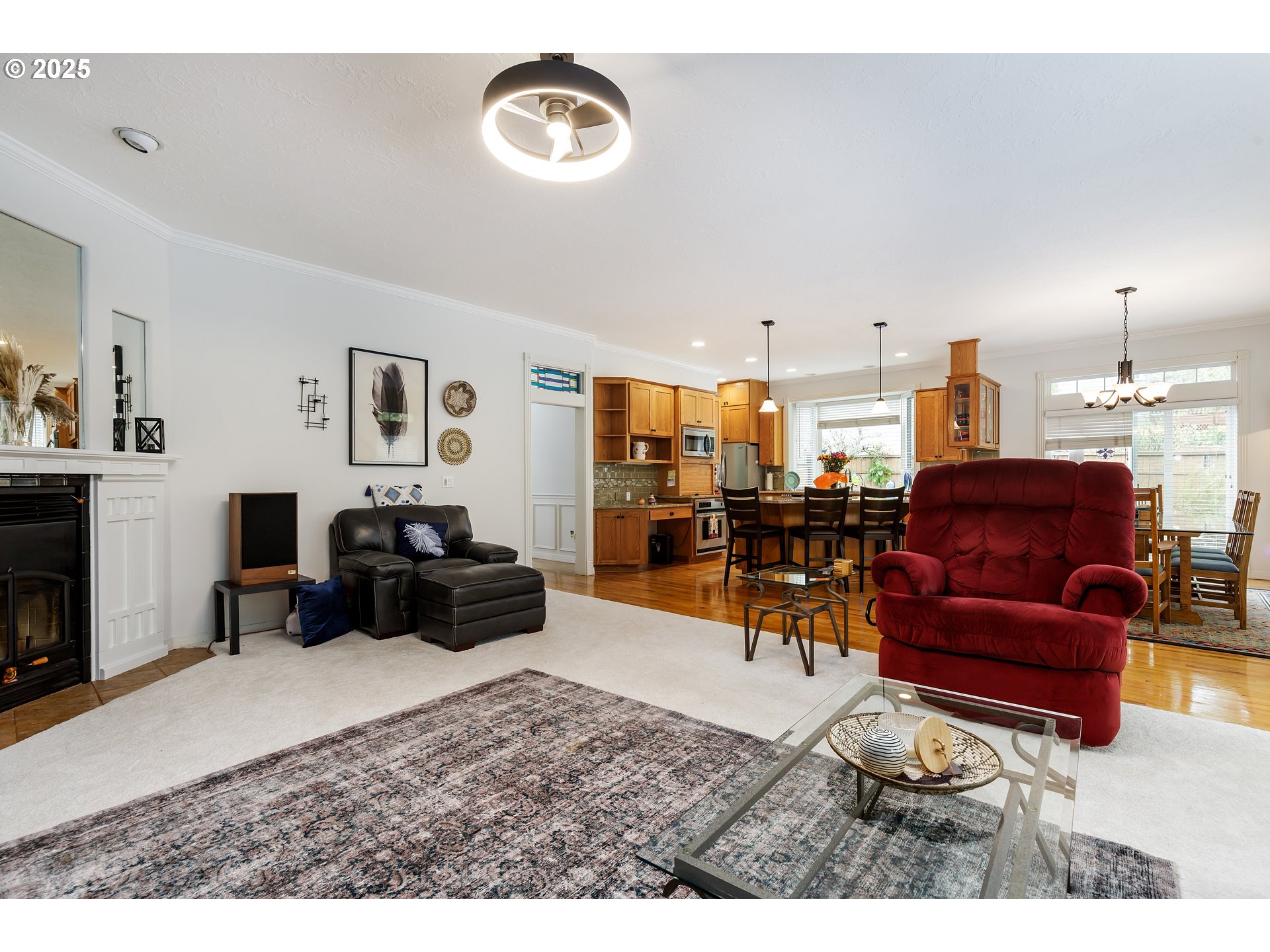 2573 Southeast Morlan Way Gresham, OR 97080 - Photo 22 of 47 a living room with furniture and a flat screen tv