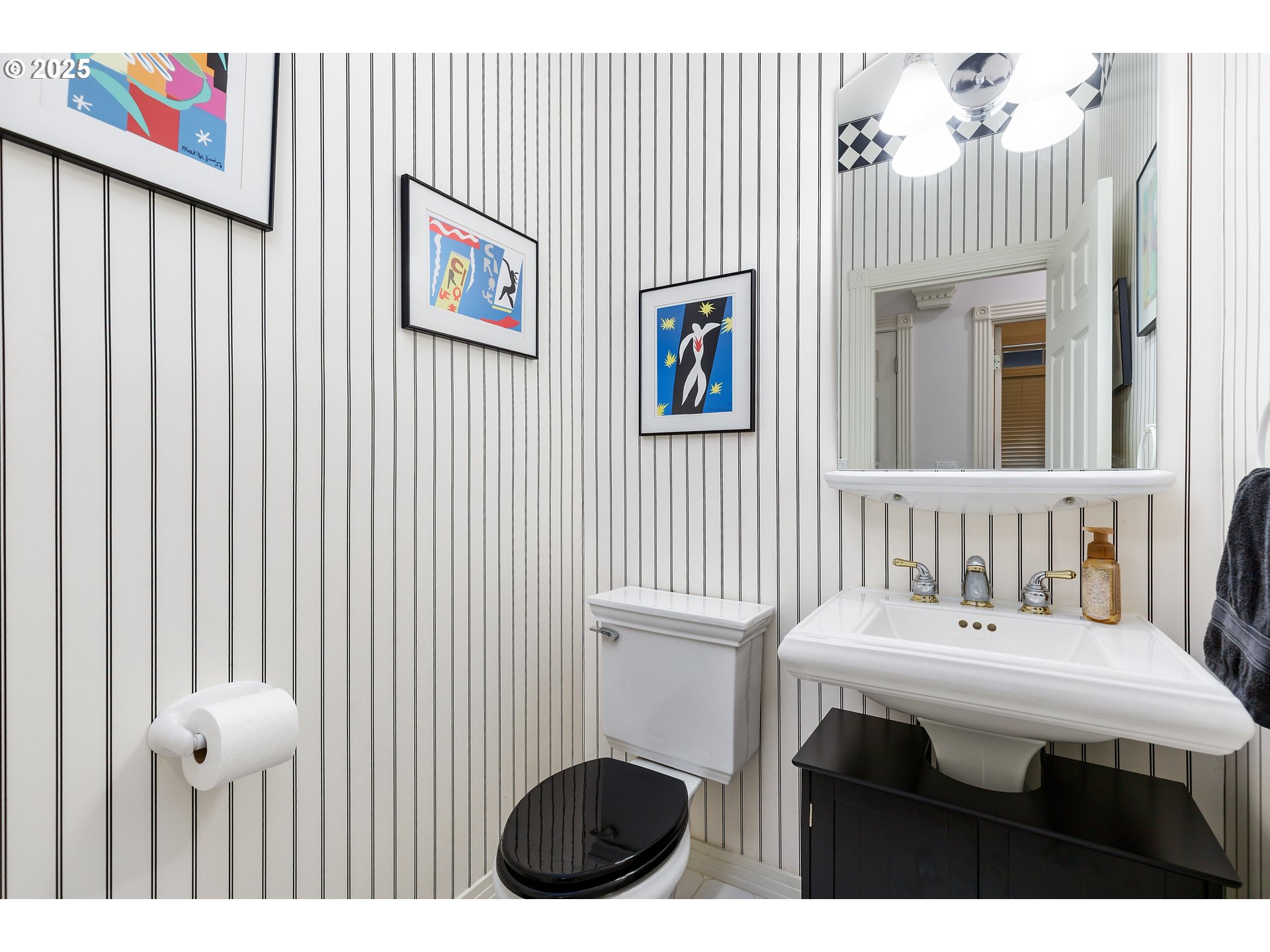 2573 Southeast Morlan Way Gresham, OR 97080 - Photo 23 of 47 a bathroom with a sink a mirror and a toilet