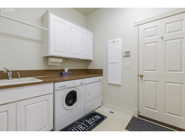 a room with gym equipment and windows