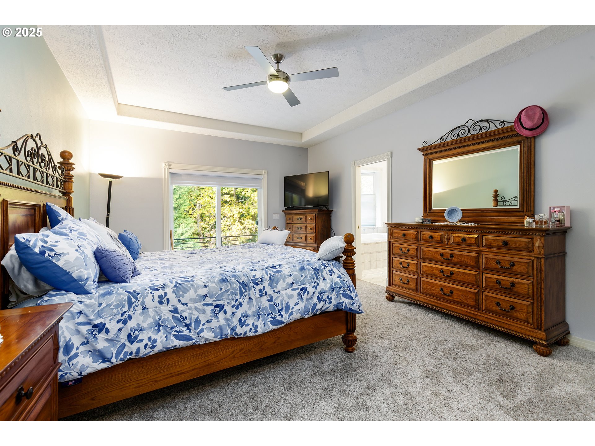 2573 Southeast Morlan Way Gresham, OR 97080 - Photo 28 of 47 a bedroom with a bed and a dresser