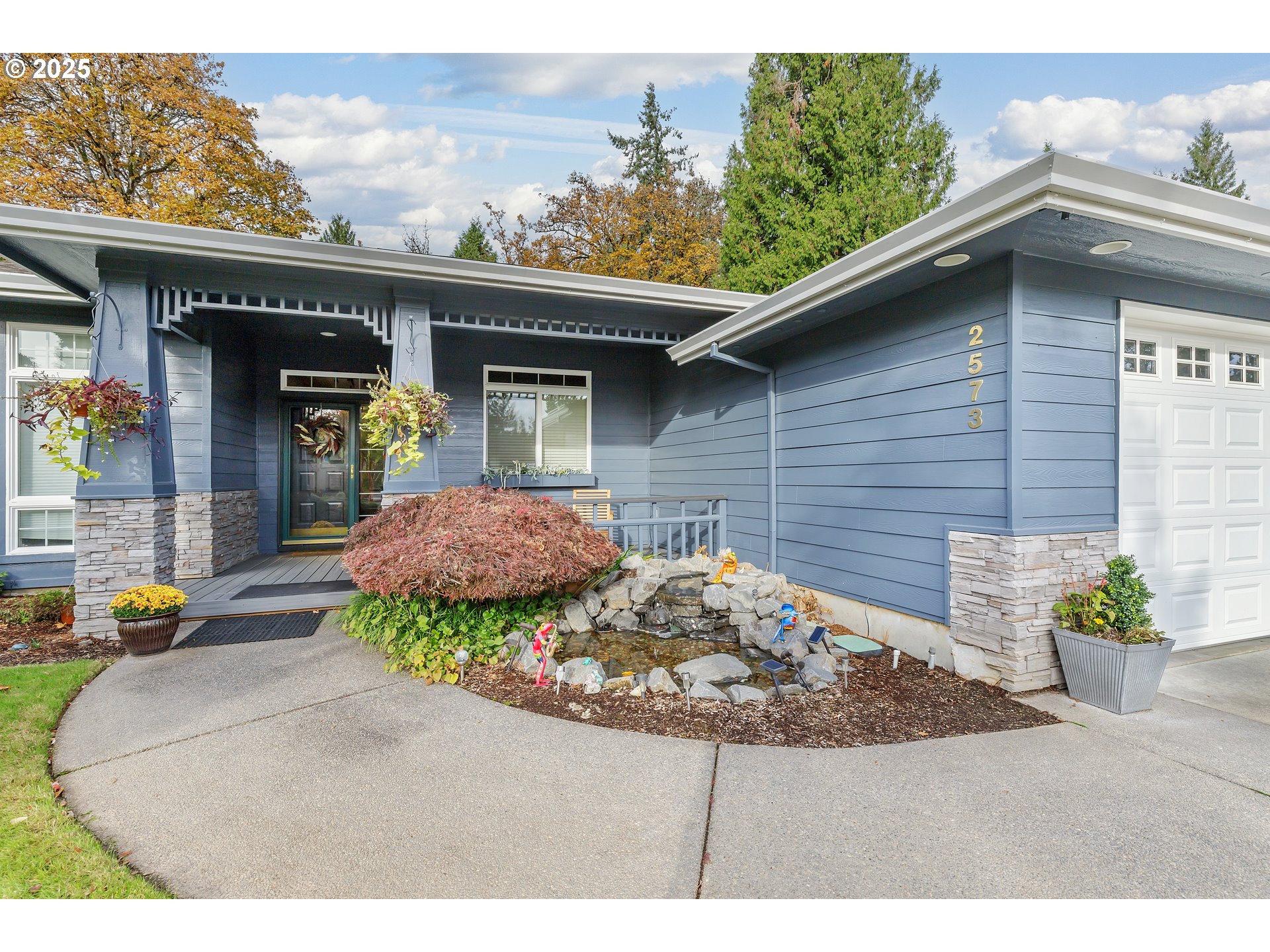 2573 Southeast Morlan Way Gresham, OR 97080 - Photo 4 of 47 a view of a house with a patio