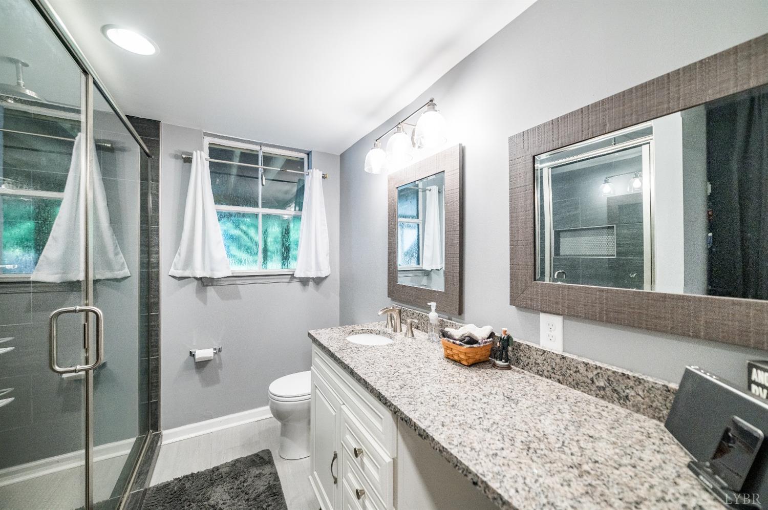 1129 Rugby Road Lynchburg, VA 24503 - Photo 43 of 56 Large newly added full bath in basement with semi-seamless shower, tiled shower & granite!!