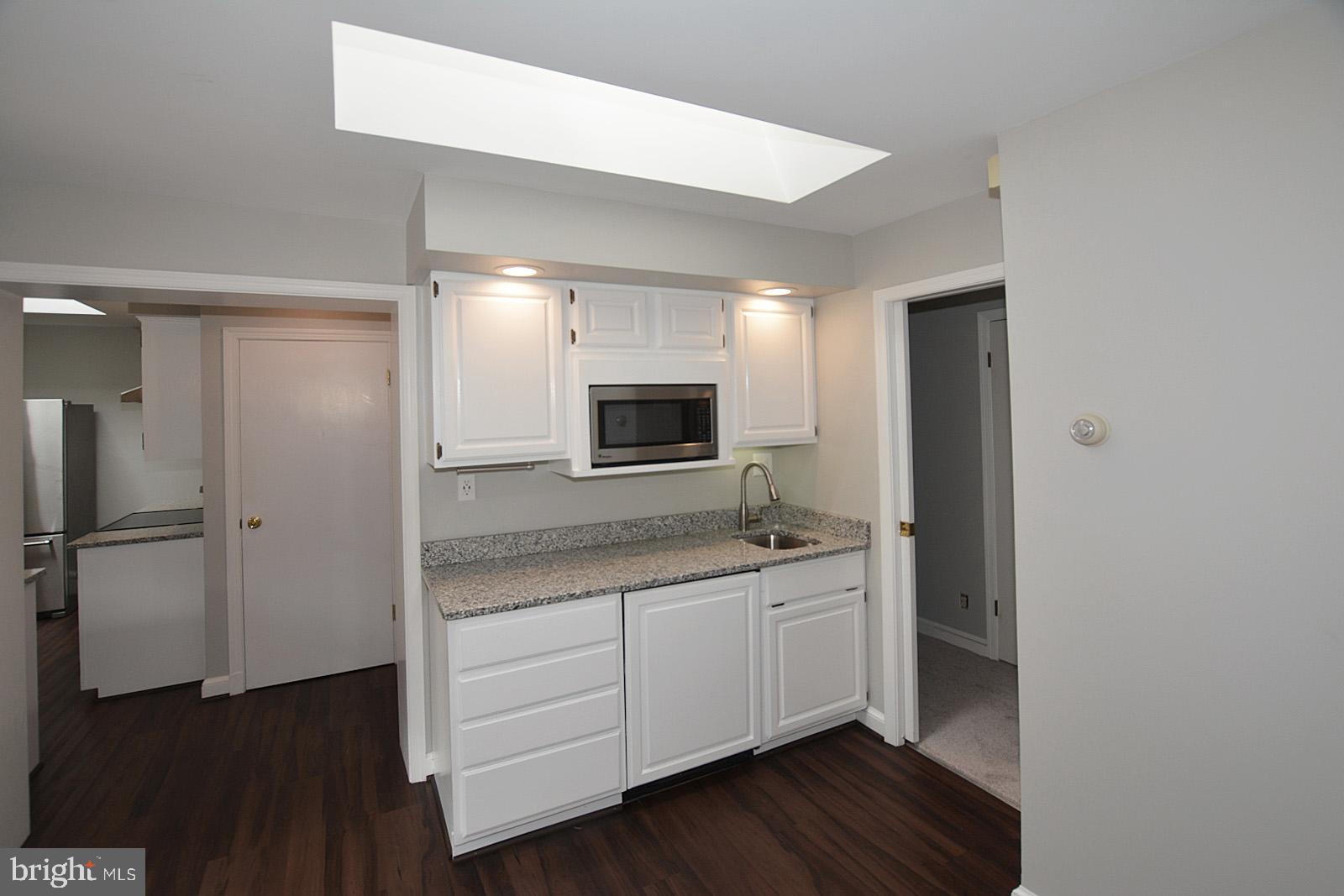 521 Beulah Road Vienna, VA 22180 - Photo 14 of 45 Family Room Wet Bar - Mini-Fridge & Skylight