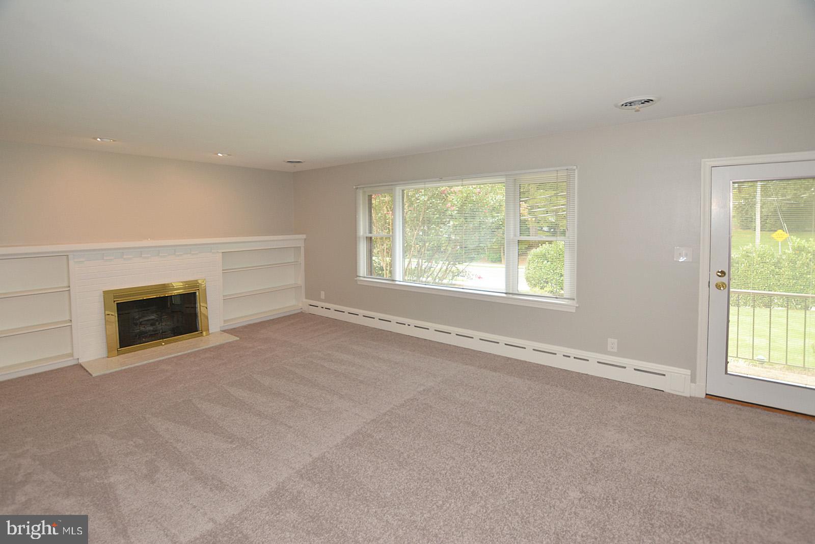 521 Beulah Road Vienna, VA 22180 - Photo 3 of 45 Living Room Features Built-Ins & Gas Fireplace