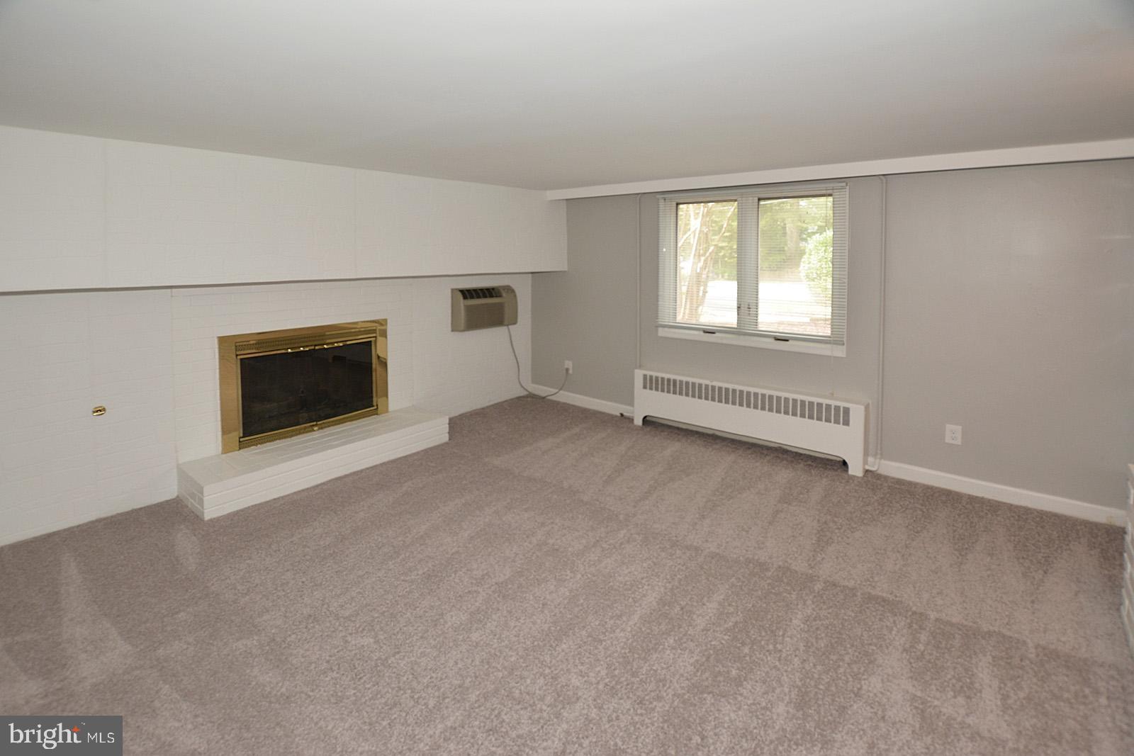 521 Beulah Road Vienna, VA 22180 - Photo 30 of 45 In-Law Family Room with Gas Fireplace