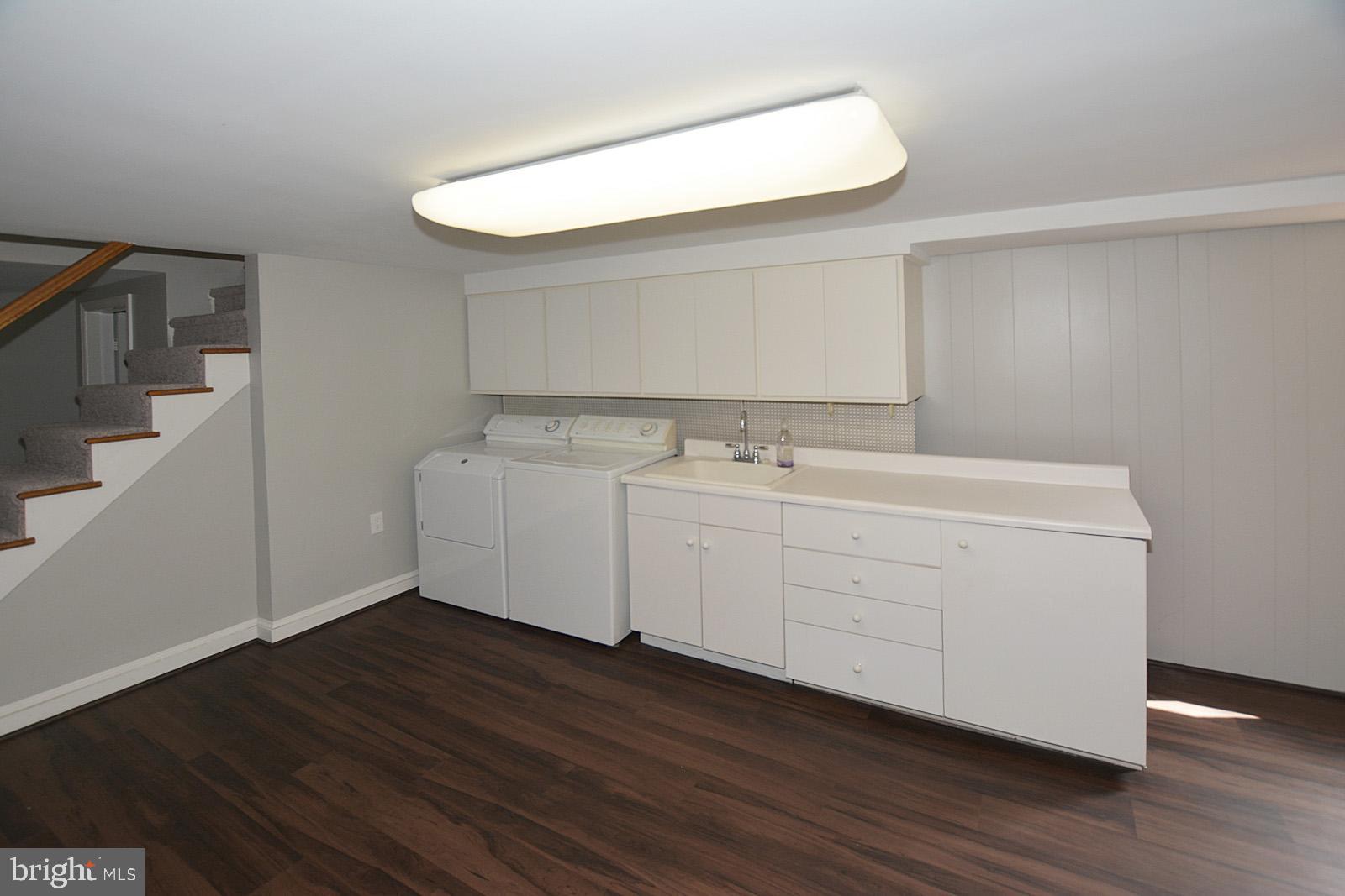 521 Beulah Road Vienna, VA 22180 - Photo 32 of 45 Huge Laundry Room with Brand New LVT Flooring