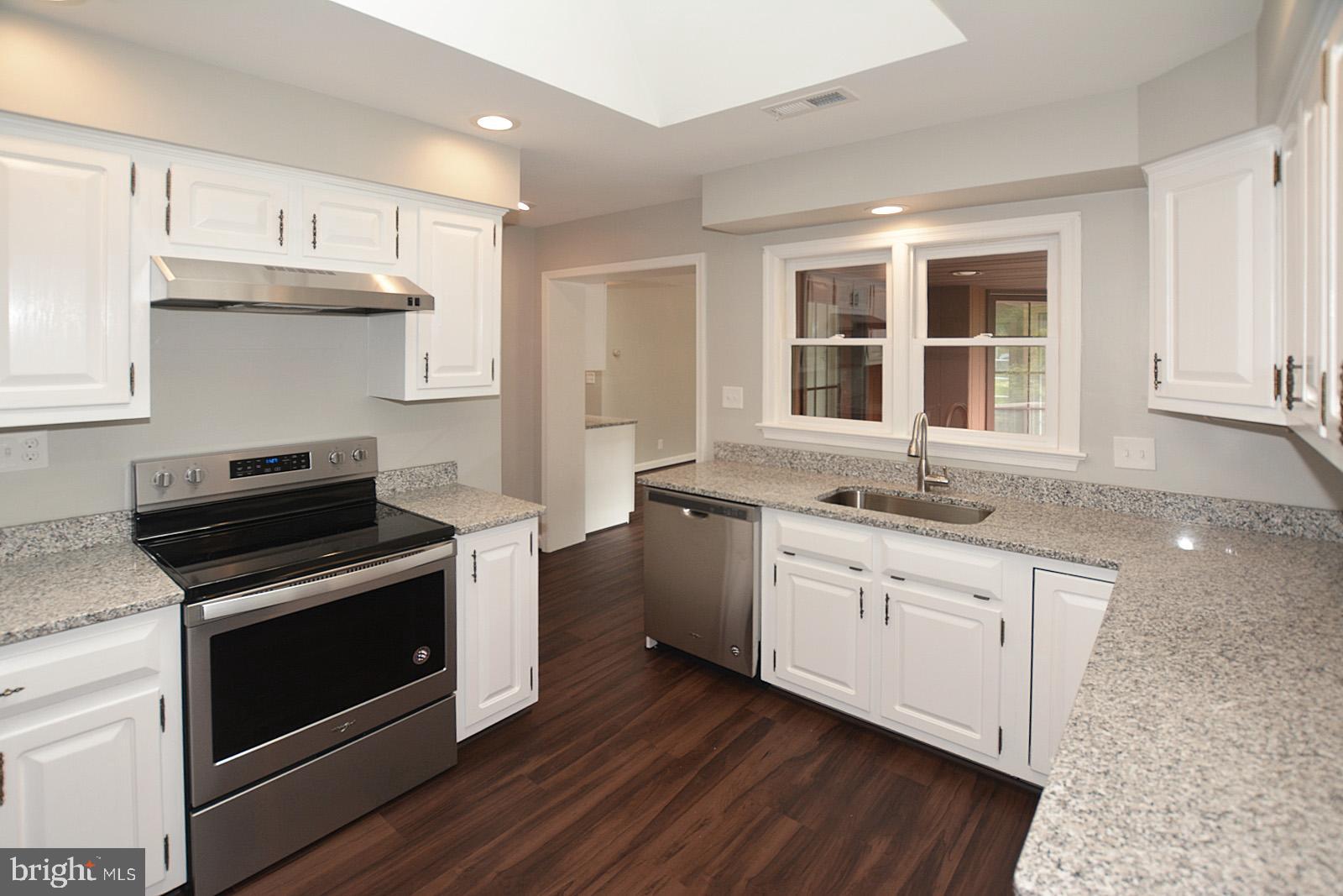 521 Beulah Road Vienna, VA 22180 - Photo 5 of 45 Beautifully-Updated Kitchen with Skylight
