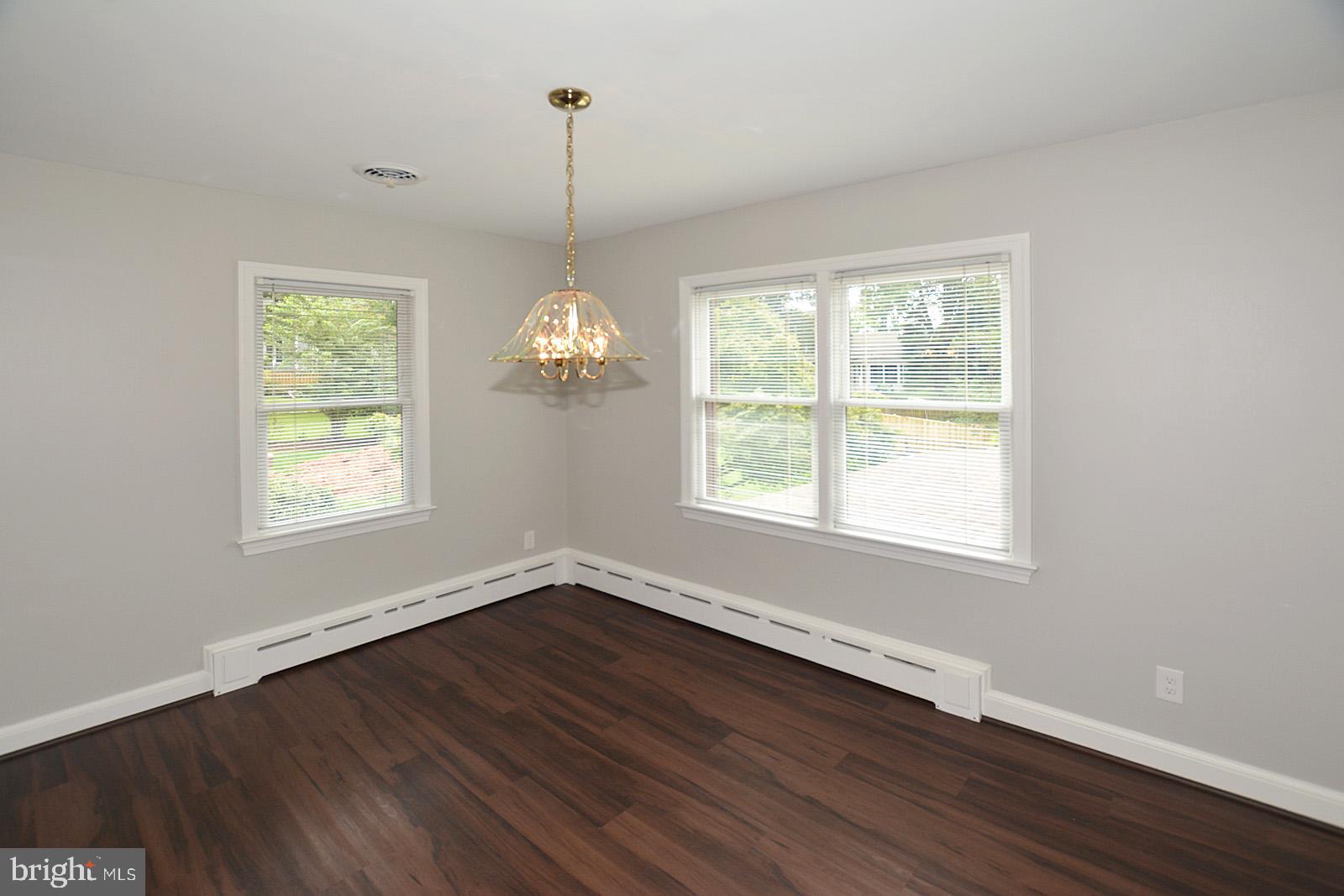 521 Beulah Road Vienna, VA 22180 - Photo 9 of 45 Spacious Dining Room with New LVT Flooring
