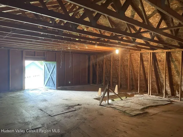 a view of a lake in middle of the green forest