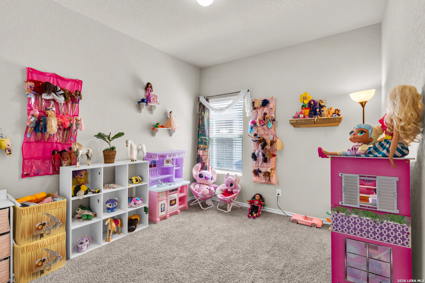 5919 Poolside Park Converse, TX 78109 - Photo 11 of 25 a children room with toys and a couch