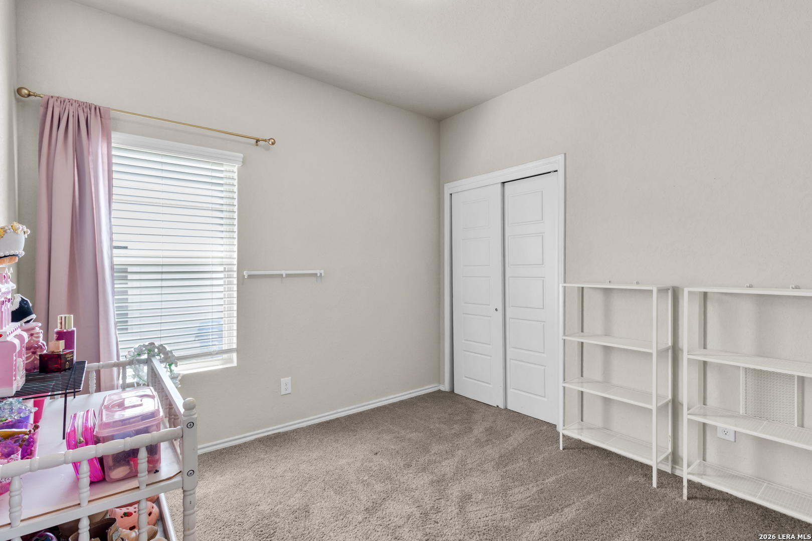 5919 Poolside Park Converse, TX 78109 - Photo 13 of 25 a room with a window and closet