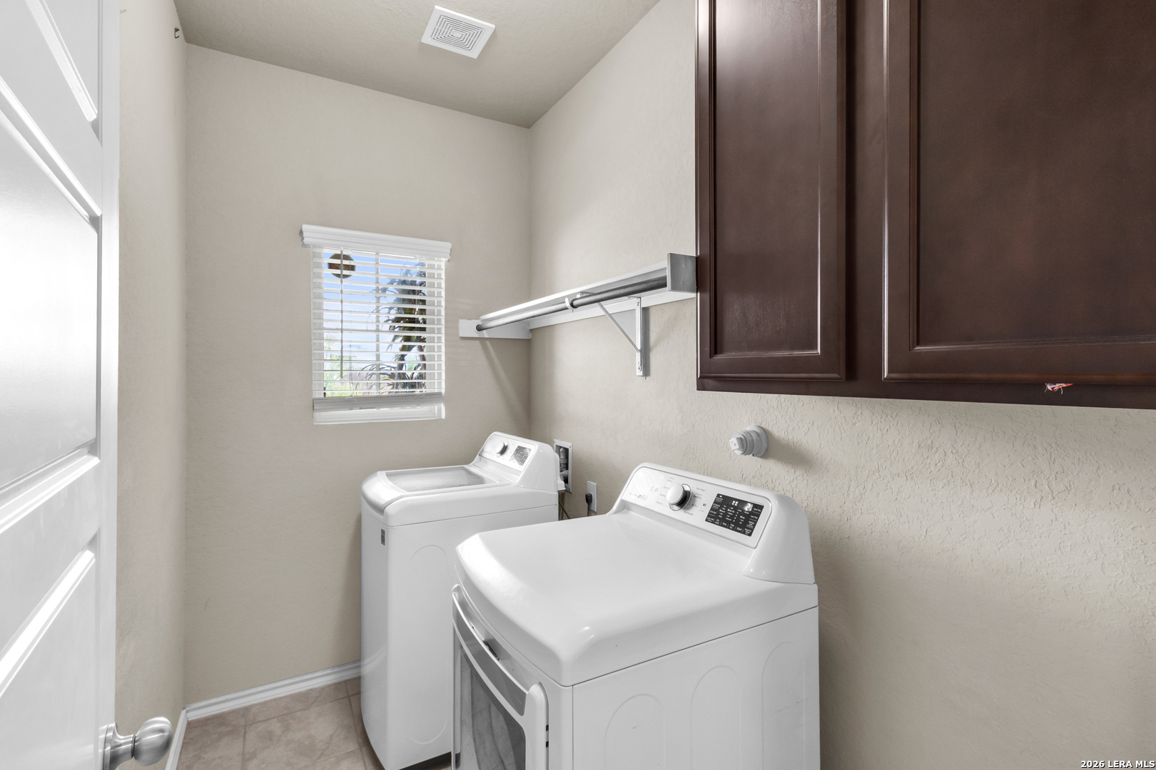 5919 Poolside Park Converse, TX 78109 - Photo 20 of 25 a utility room with dryer and washer