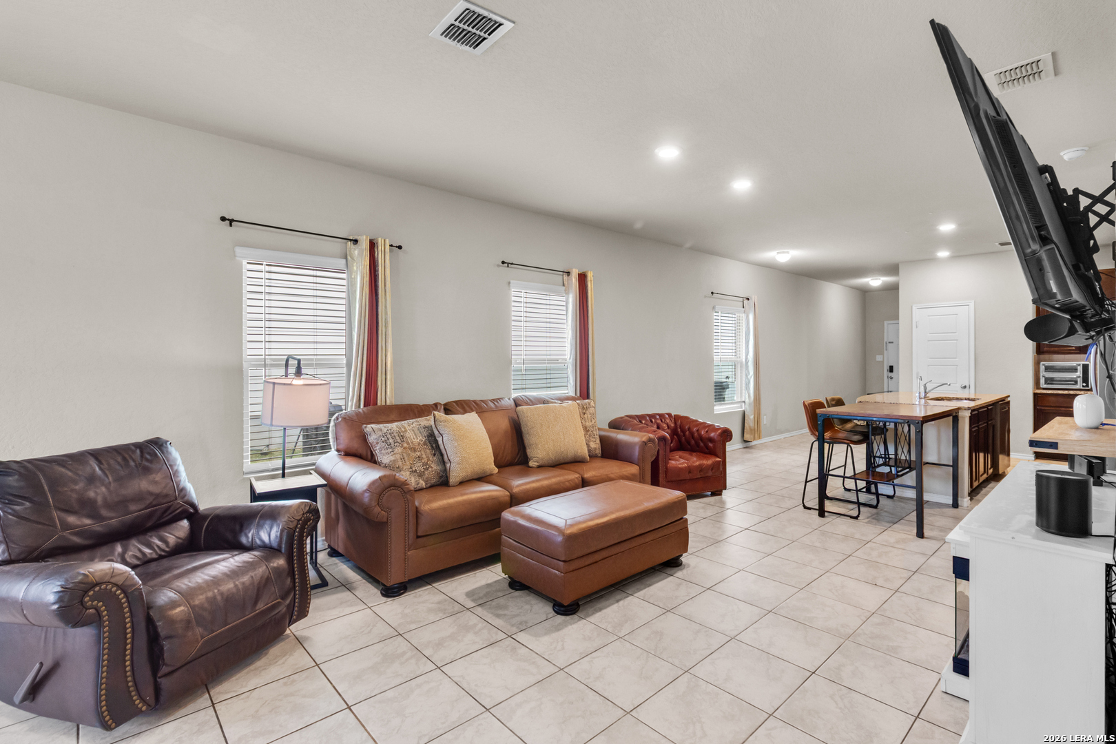 5919 Poolside Park Converse, TX 78109 - Photo 8 of 25 a living room with furniture and a window