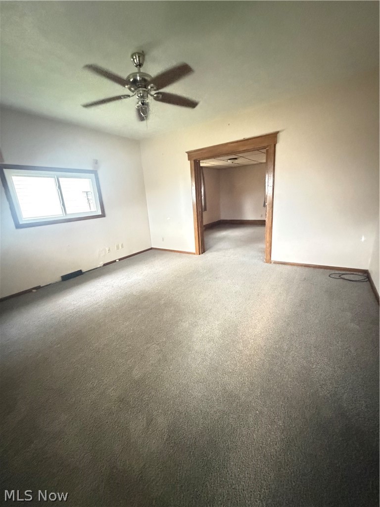 32 Cherry Road Northwest Massillon, OH 44646 - Photo 14 of 14 Living room with access to front porch, Primary Suit and Dining room