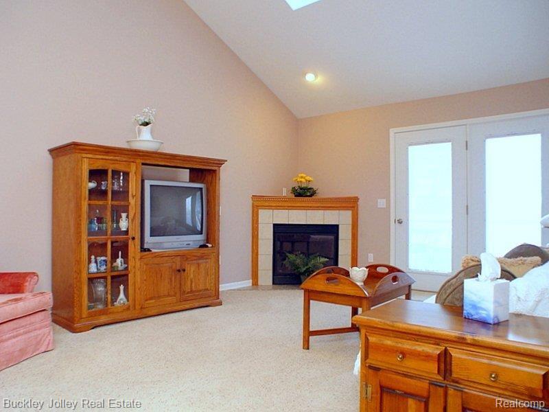 4698 Summer Ridge Drive, Unit 38 Howell, MI 48843 - Photo 2 of 21 Gas Fireplace.jpg