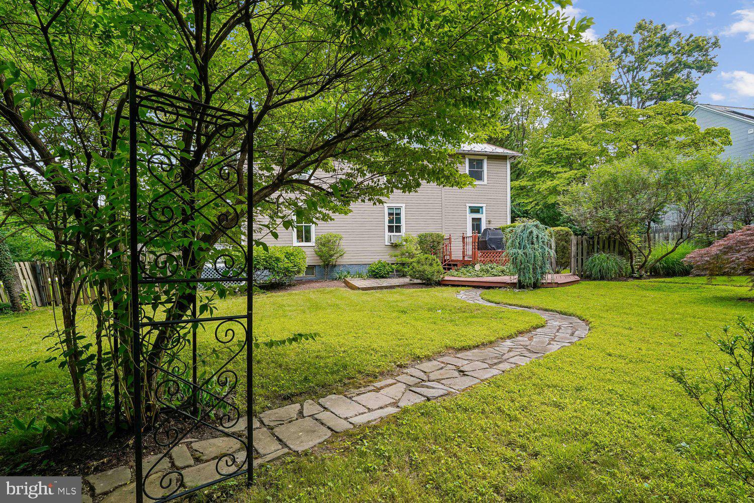 16 Maple Avenue Washington Grove, MD 20880 - Photo 7 of 58 Charming garden path leads to a serene retreat.