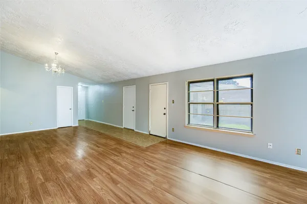 an empty room with windows