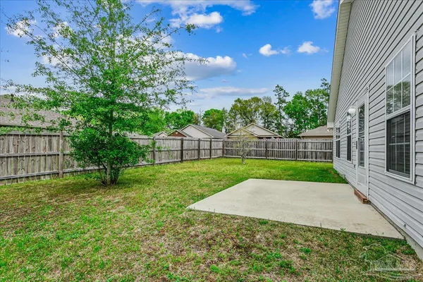 a view of a backyard with a garden