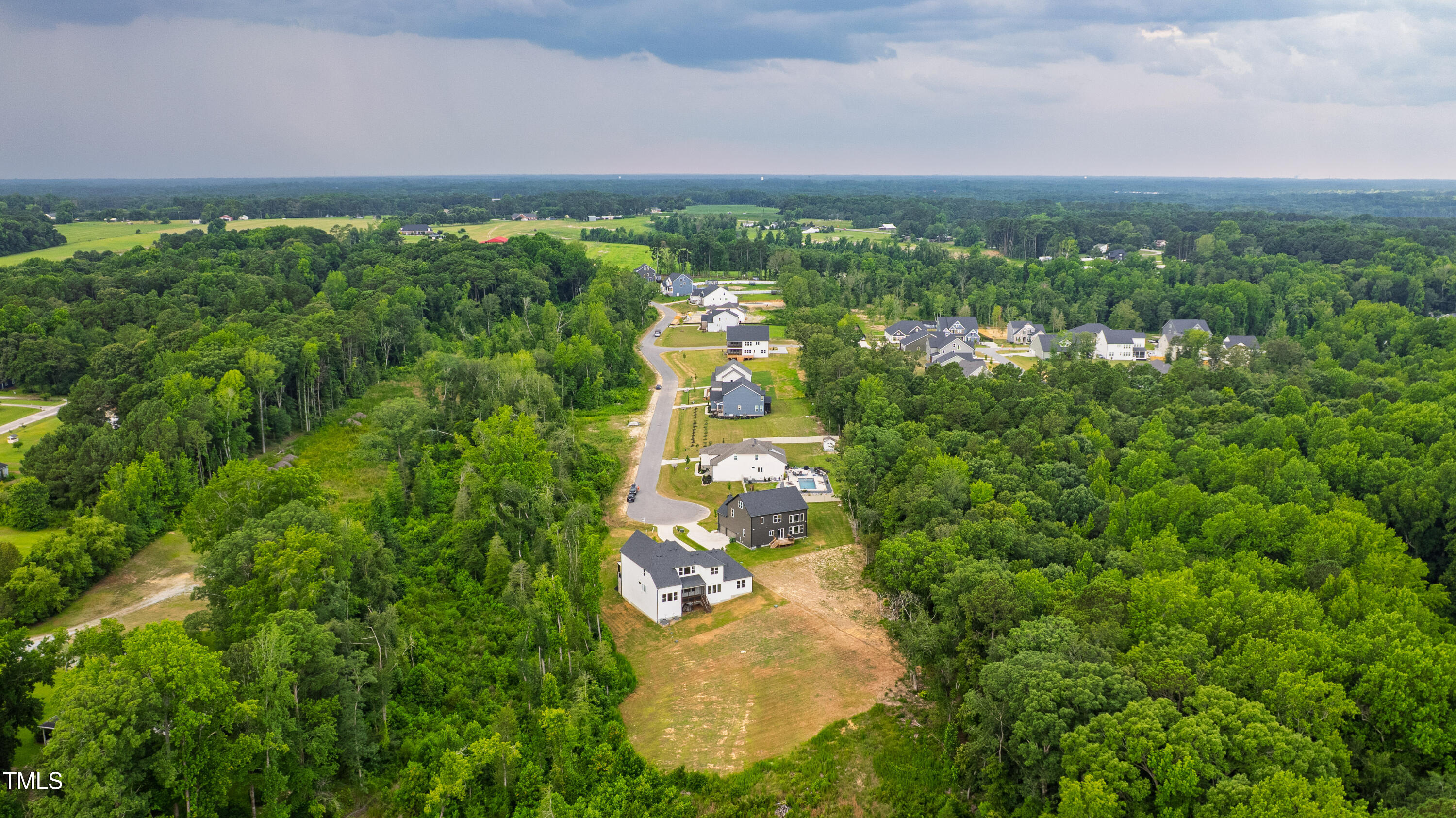 164 East E Spring Angier, NC 27501 - Photo 29 of 36 Expansive 2.5 Acres of Natural Beauty