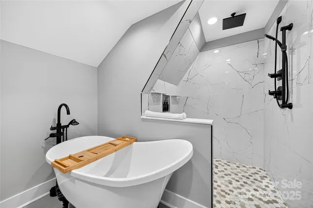 a workspace with wooden floor and furniture