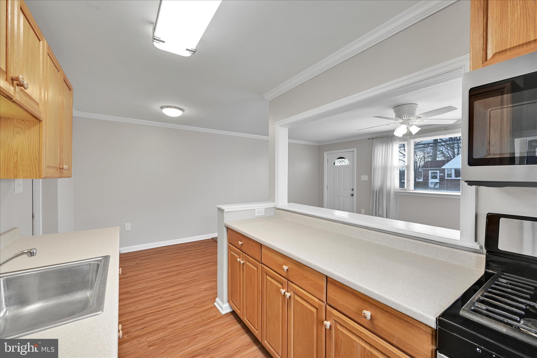 204 Ridley Avenue Folsom, PA 19033 - Photo 13 of 30 a view of a kitchen cabinets and a wooden floor