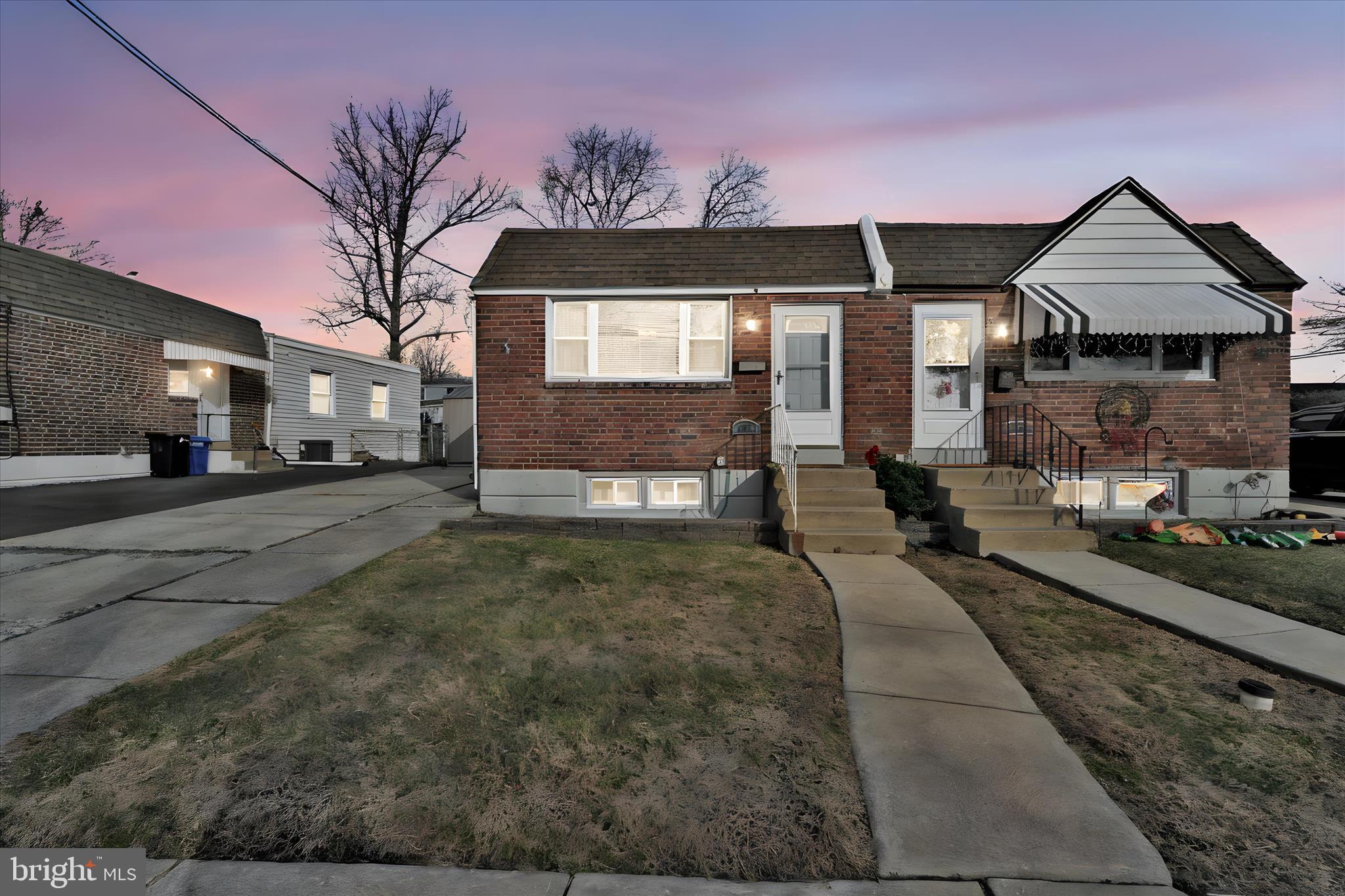 204 Ridley Avenue Folsom, PA 19033 - Photo 2 of 30 a front view of a house with a yard