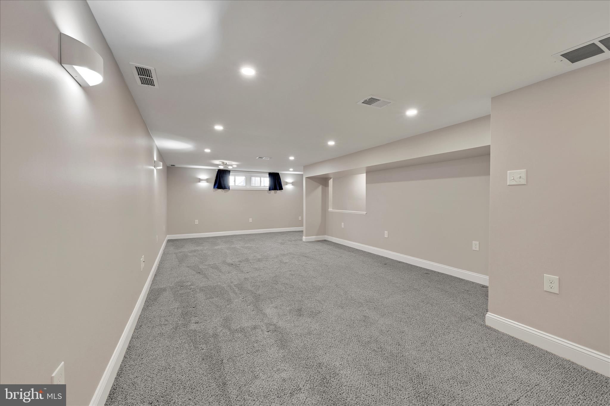 204 Ridley Avenue Folsom, PA 19033 - Photo 23 of 30 an empty room with a empty space and windows