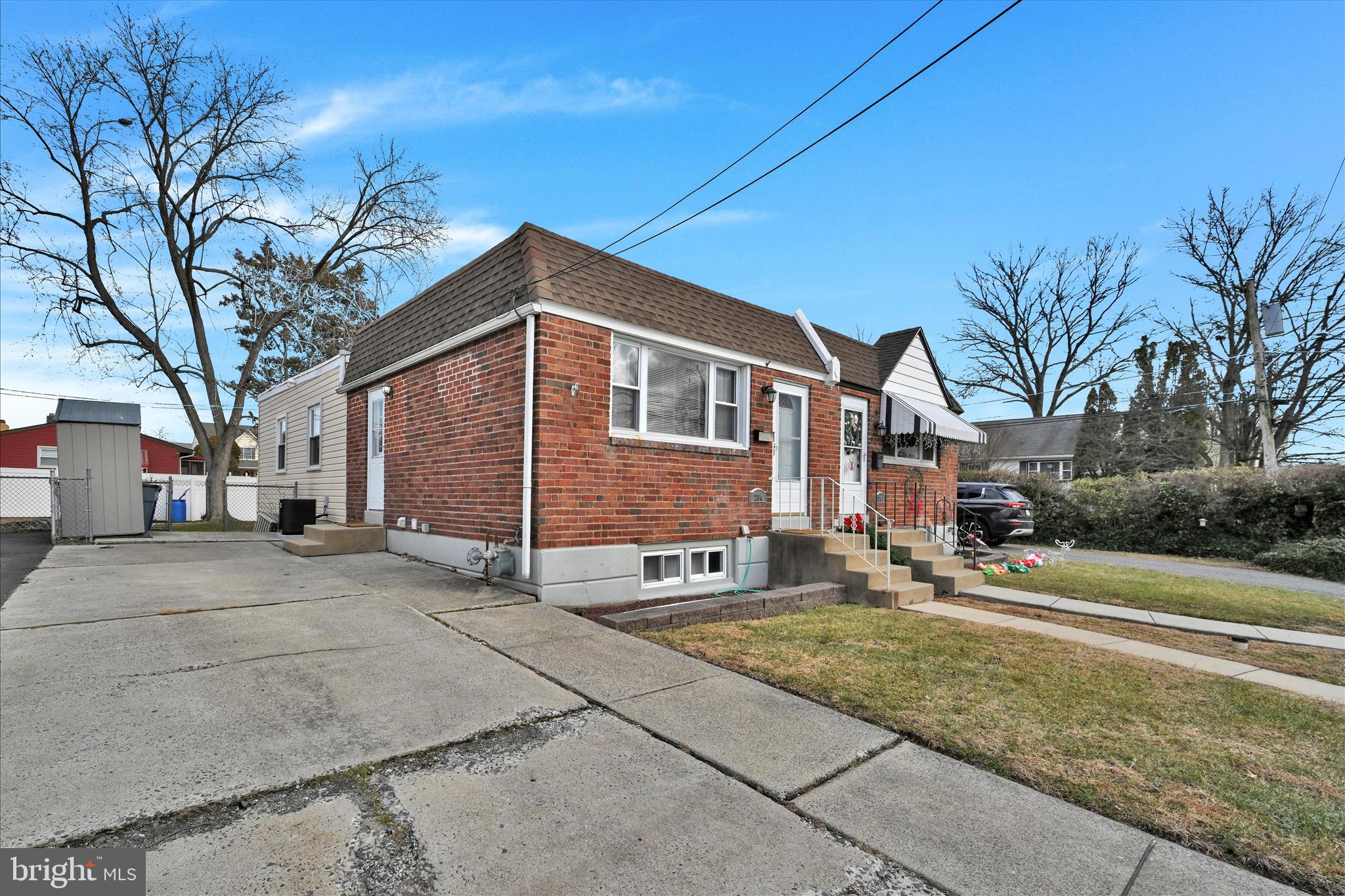 204 Ridley Avenue Folsom, PA 19033 - Photo 3 of 30 a front view of a house with a yard