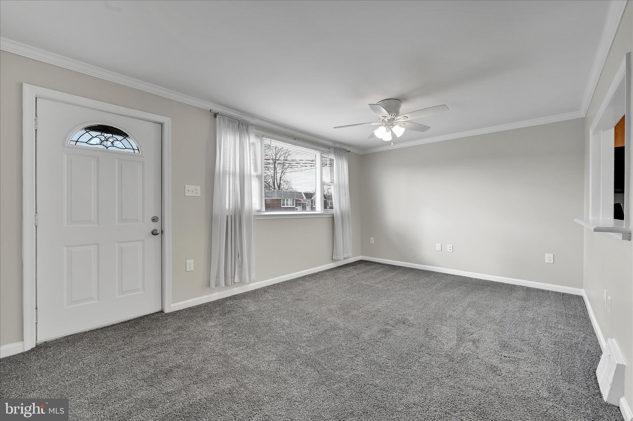 204 Ridley Avenue Folsom, PA 19033 - Photo 4 of 30 a view of an empty room with a window