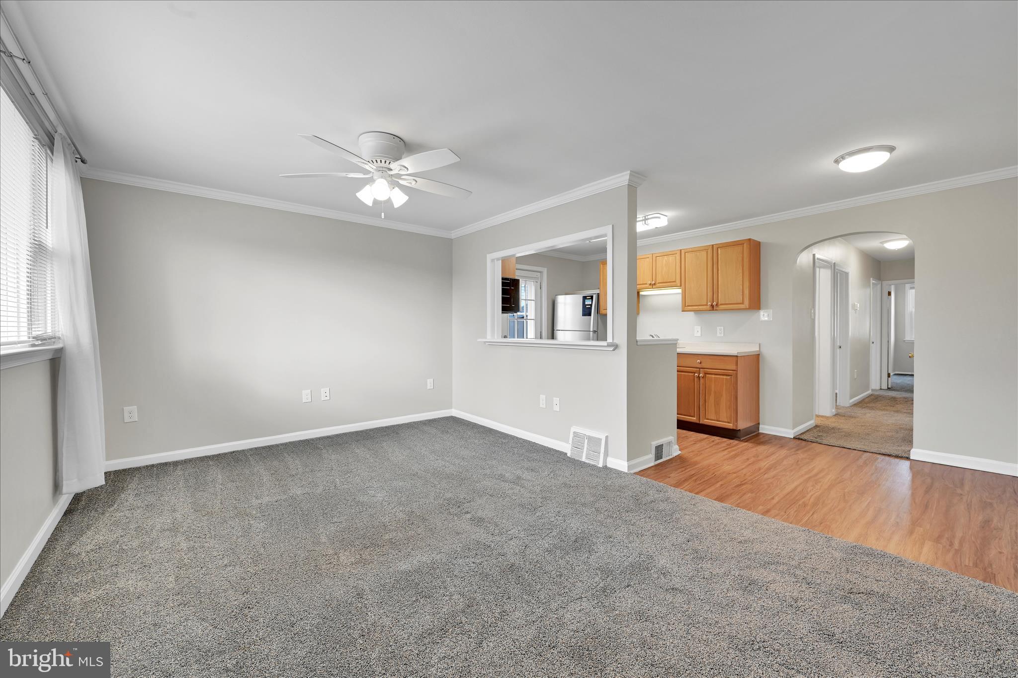 204 Ridley Avenue Folsom, PA 19033 - Photo 6 of 30 an empty room with windows and fireplace