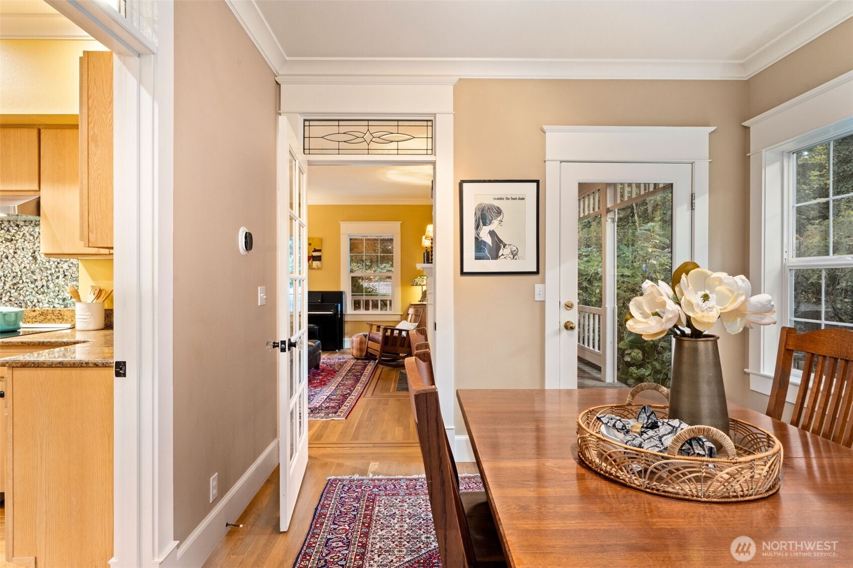 8991 Springwood Avenue Northeast Bainbridge Island, WA 98110 - Photo 22 of 36 a living room with furniture and a table