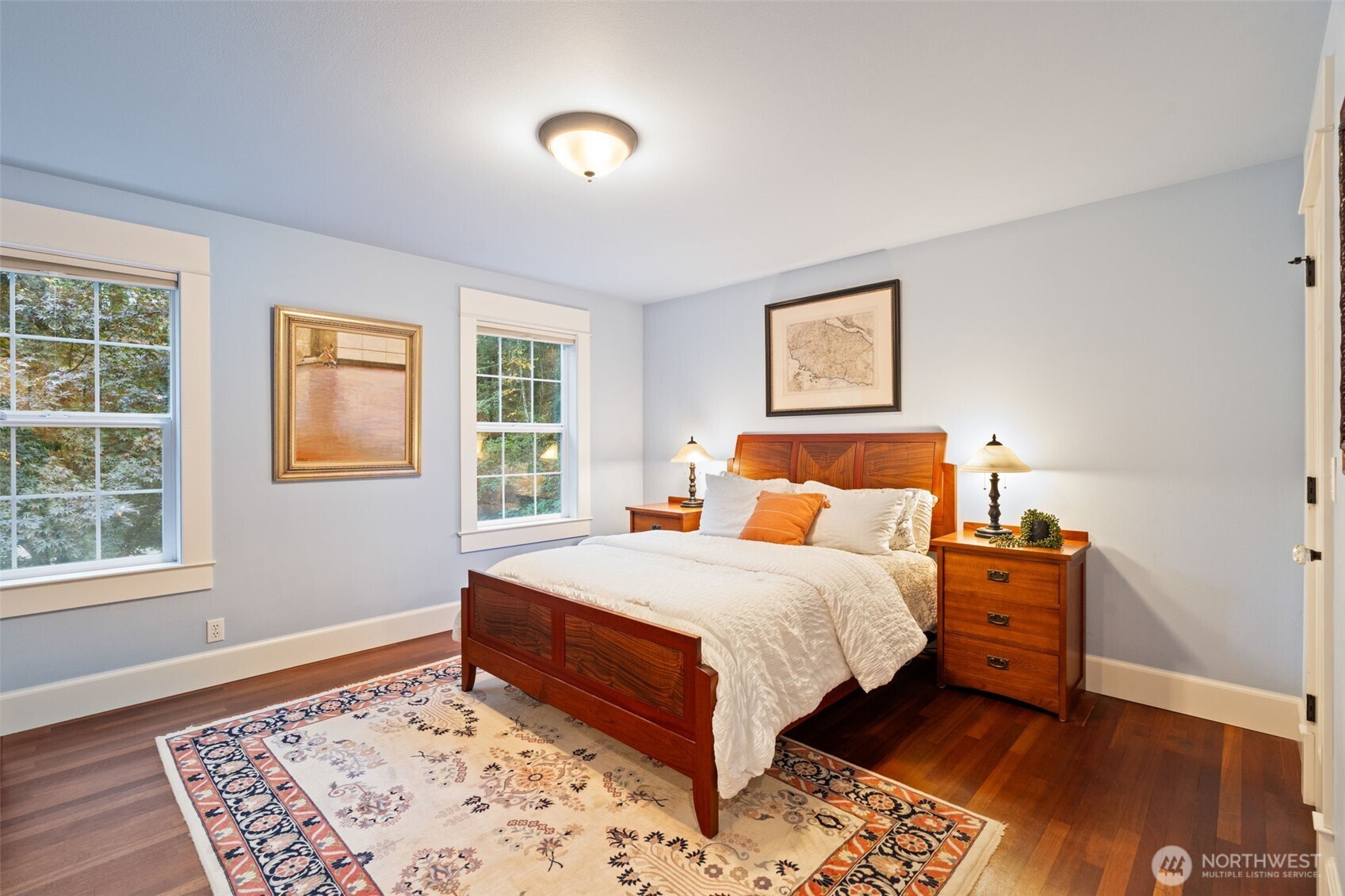 8991 Springwood Avenue Northeast Bainbridge Island, WA 98110 - Photo 25 of 36 a bedroom with a bed and a window